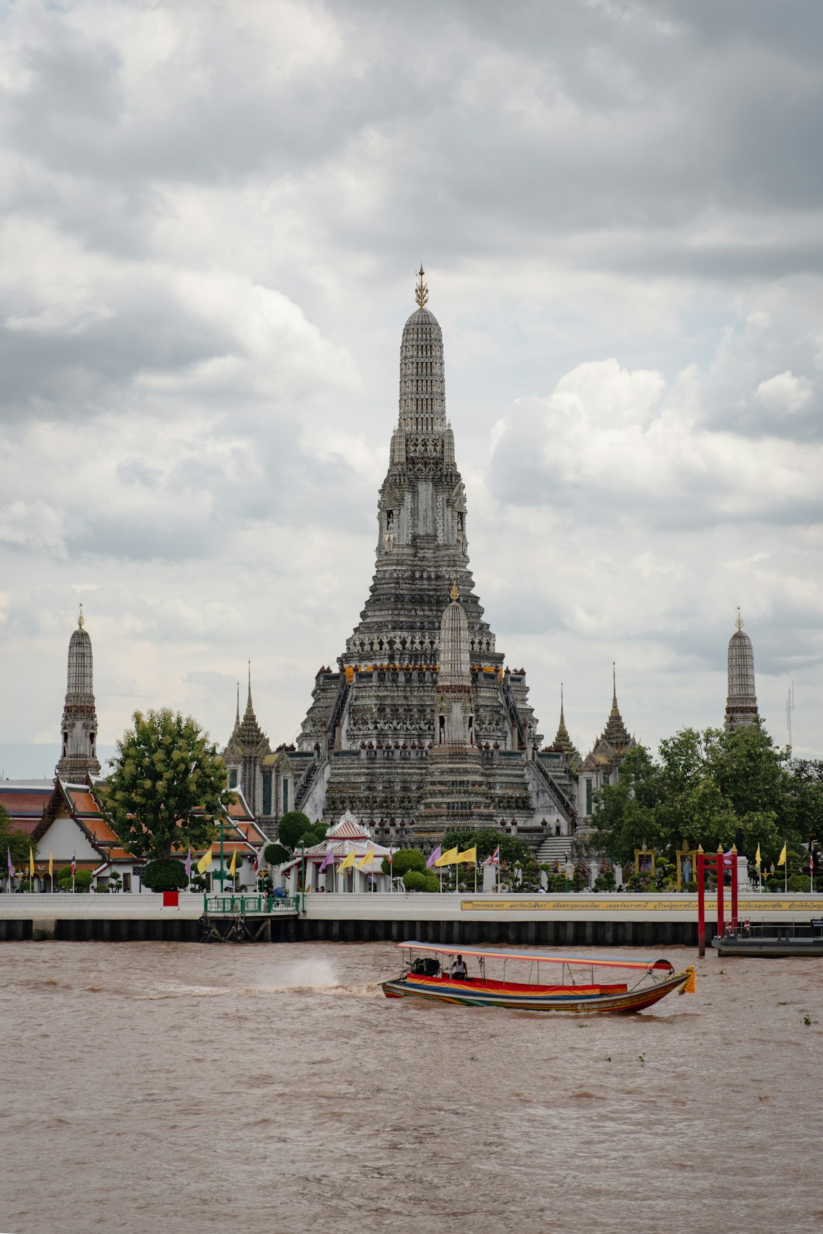 Wat Arun temple on the Chao Phraya River, Bangkok — January in Thailand